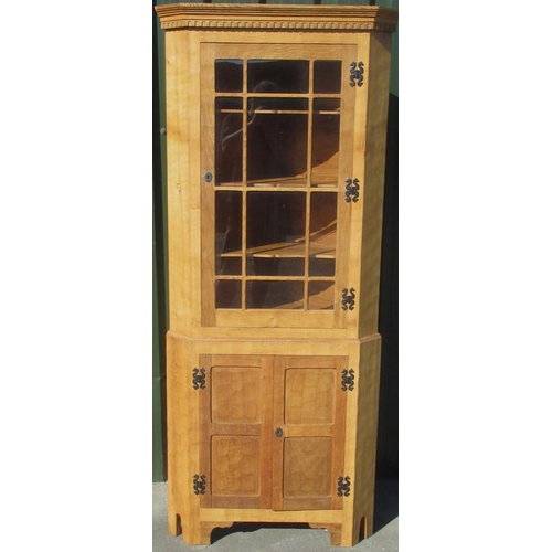 1355 - Alan Acornman Grainger, Acorn Industries Brandsby - an adzed oak standing corner cabinet, with denti... 