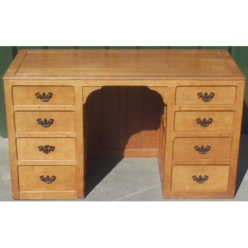 1359 - Derek Fishman Slater of Crayke - an oak kneehole desk, moulded top with adzed border and six adzed p... 