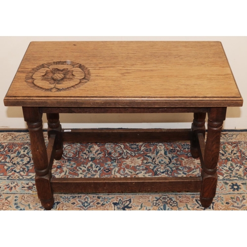 1377 - C17th style oak rectangular coffee table, moulded top carved with a Yorkshire Rose on turned and blo... 