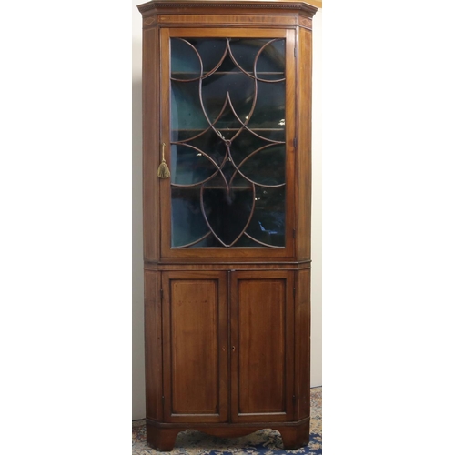 1311 - George 111 boxwood strung mahogany standing corner cabinet, gadrooned cornice and scrolled astragal ... 