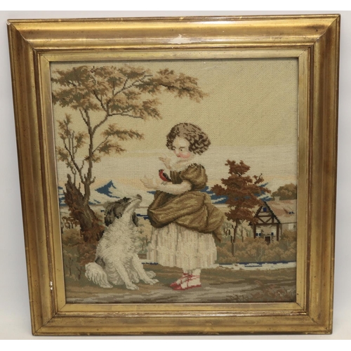 1119 - Victorian coloured woolwork study of a young girl with a bird and a dog in a garden landscape, 34cm ... 