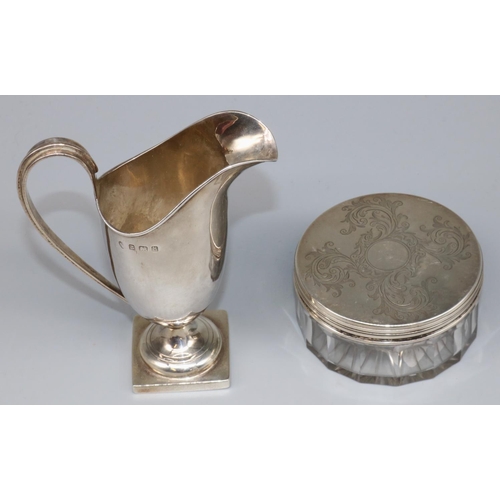 1086 - Victorian hallmarked silver topped glass dressing table jar, engraved with scrolls around a central ... 