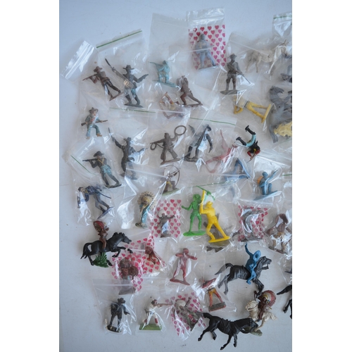 295 - Extensive collection of plastic toy figures, mostly Cowboys and Indians to include Timpo, Britain's ... 