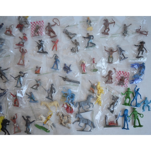 295 - Extensive collection of plastic toy figures, mostly Cowboys and Indians to include Timpo, Britain's ... 