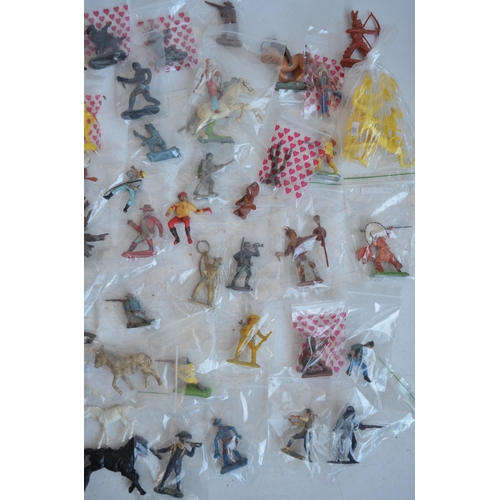 295 - Extensive collection of plastic toy figures, mostly Cowboys and Indians to include Timpo, Britain's ... 