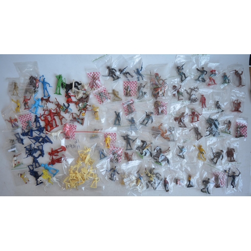 295 - Extensive collection of plastic toy figures, mostly Cowboys and Indians to include Timpo, Britain's ... 