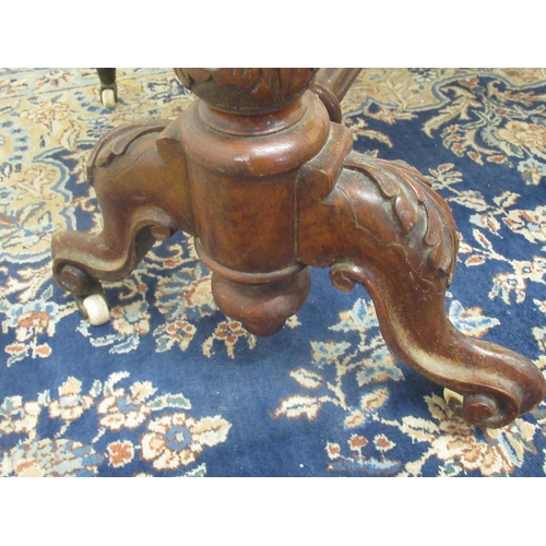 1332 - Victorian figured walnut Sutherland table, two fall leaves on fluted baluster supports and scroll fe... 