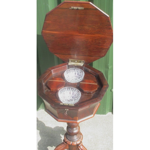 1325 - Victorian rosewood tripod teapoy, decagonal hinged top with two caddies bowls, on vase turned column... 