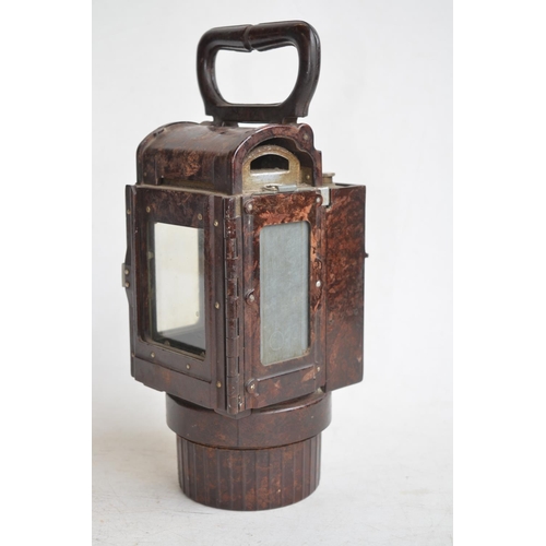 47 - World War II German carbide Bakelite railway/army lantern with folding carry handle. Attachment brac... 