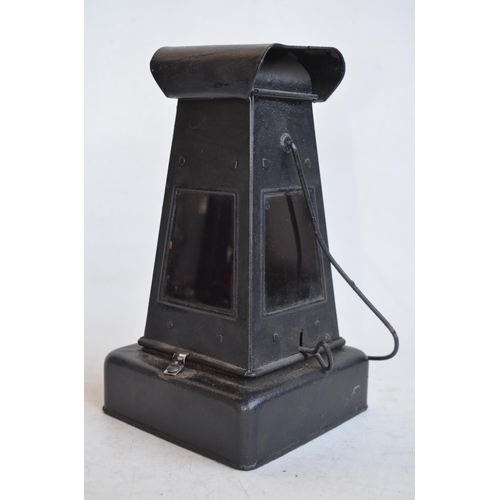 65 - World War II British blackout oil lantern (missing sloped side light inhibitor panels), a similarly ... 