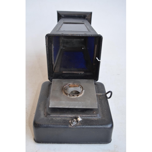 65 - World War II British blackout oil lantern (missing sloped side light inhibitor panels), a similarly ... 