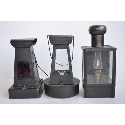 65 - World War II British blackout oil lantern (missing sloped side light inhibitor panels), a similarly ... 