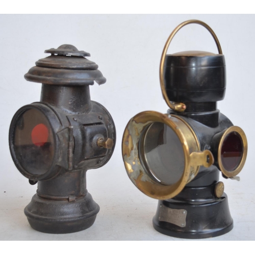 70 - A pair of vintage oil burning vehicle lamps to include a British made Lucas No 633 