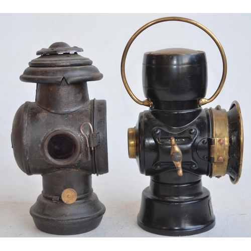 70 - A pair of vintage oil burning vehicle lamps to include a British made Lucas No 633 