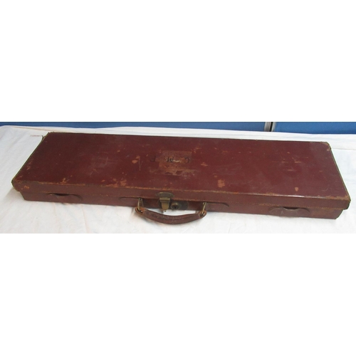 105 - C20th brown leather shotgun case, fitted red baize interior, fitted lock (no key), initialled to top... 