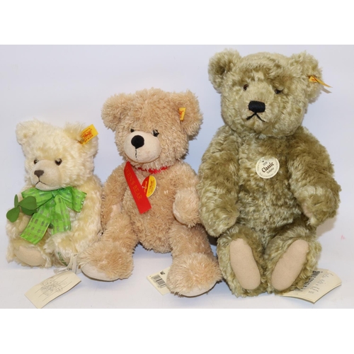 18 - Three Steiff teddy bears: 1920 replica Classic, Good Luck bear with green ribbon, and one other, max... 