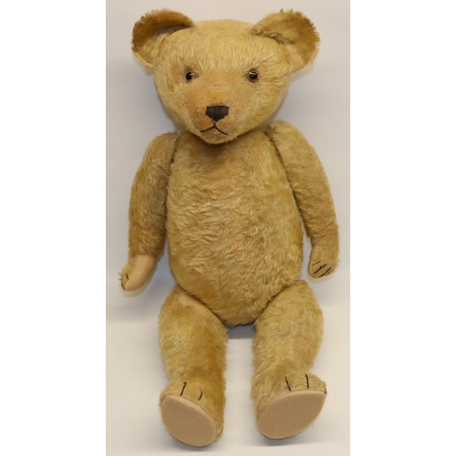 66 - Mid C20th blonde mohair teddy bear, with woolwork nose and felt pads, H67cm