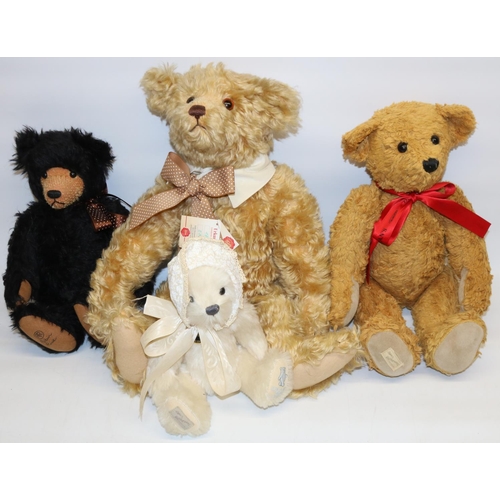 98 - Four modern collectable teddy bears, comprising a Robin Rive bear with black fur, Dean's Rag Book be... 