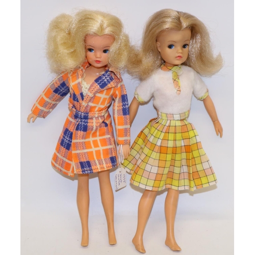 211 - Sindy; Lovely lively Sindy 1975, in yellow checkered skirt, dark blonde, head stamped 033055x, and a... 