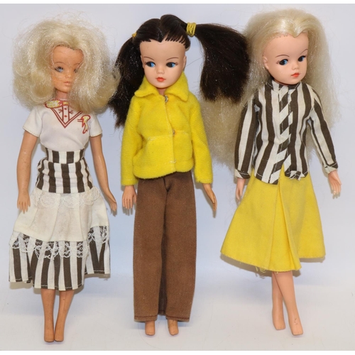 223 - Sindy; Three Sindy dolls, heads all stamped Sindy 033055x, with various hair styles and colours, all... 