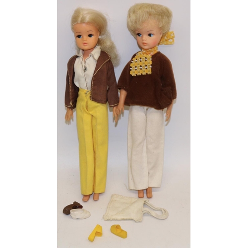 224 - Sindy; Two blonde haired Sindy dolls, their heads stamped 033055x, and Sindy 033055x, both in 'Mix '... 