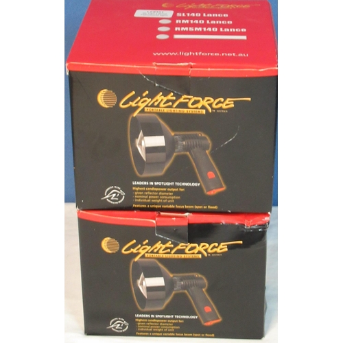 56 - Two boxed LightForce portable spotting lamps