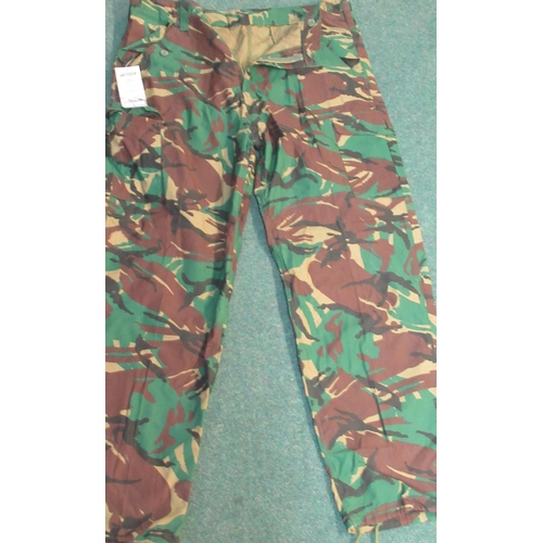 68 - Five pairs of military camo trousers (as new) Sizes, 38 x 2, 44, 42 x 2