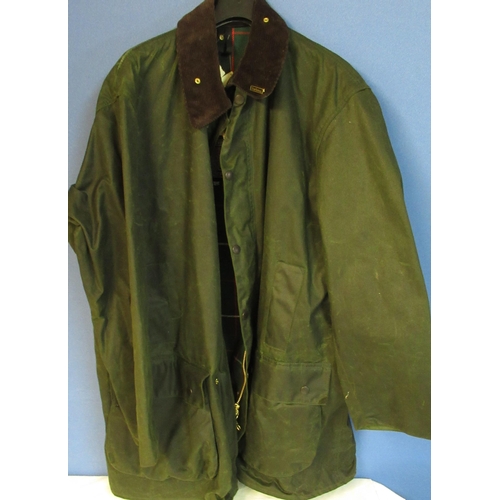 71 - As new Barbour 'Northumbria', Olive. Size 50. Tin of Barbour wax