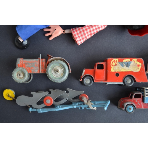 302 - Two Pelham Puppets, a collection of vintage diecast vehicles from Dinky, Chad Valley and Tri-Ang and... 