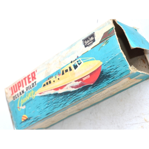 306 - Two vintage Sutcliffe Models clockwork tinplate boat models to include a boxed 