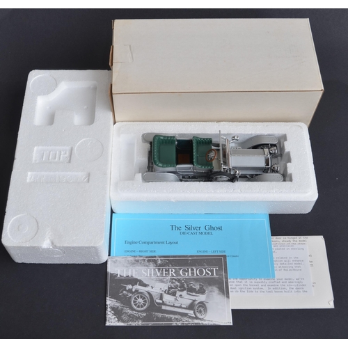 310 - Two boxed 1/24 scale diecast Rolls Royce models to include a Franklin Mint 1907 Silver Ghost (mint c... 