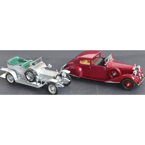 310 - Two boxed 1/24 scale diecast Rolls Royce models to include a Franklin Mint 1907 Silver Ghost (mint c... 