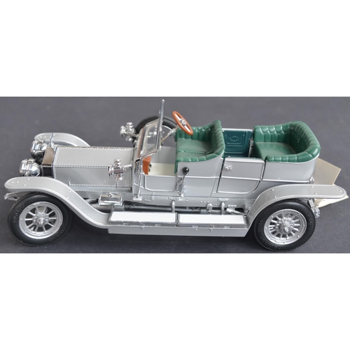 310 - Two boxed 1/24 scale diecast Rolls Royce models to include a Franklin Mint 1907 Silver Ghost (mint c... 