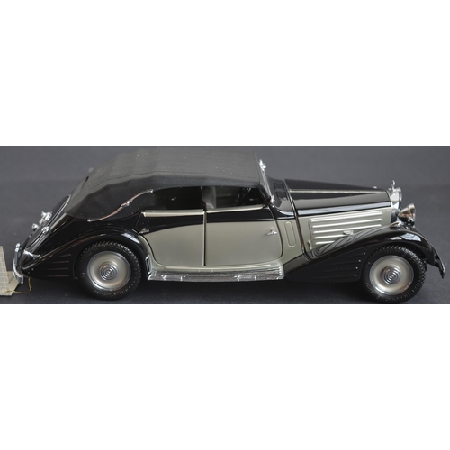 311 - Two boxed Franklin Mint 1/24 scale diecast cars to include a 1939 Maybach Zeppelin (near mint) and 1... 