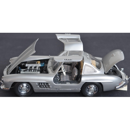 312 - Two boxed Franklin Mint 1/24 scale diecast Mercedes car models to include a 500K Special Roadster (e... 