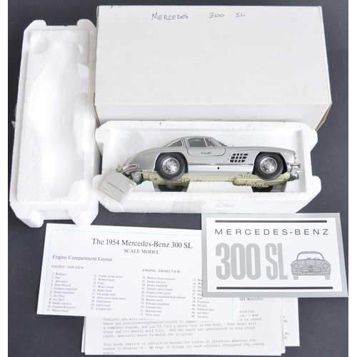 312 - Two boxed Franklin Mint 1/24 scale diecast Mercedes car models to include a 500K Special Roadster (e... 