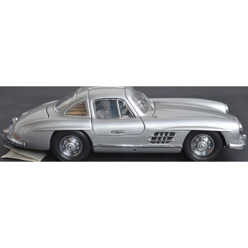 312 - Two boxed Franklin Mint 1/24 scale diecast Mercedes car models to include a 500K Special Roadster (e... 