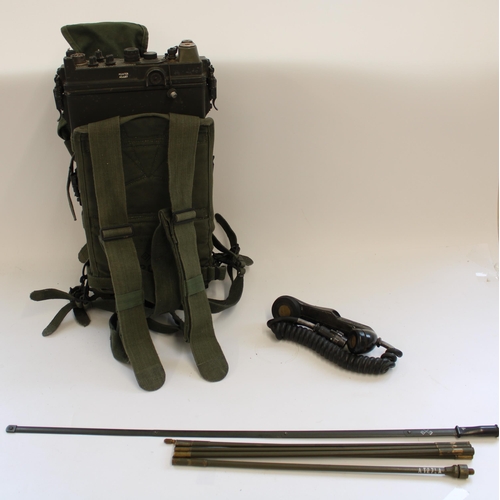 876 - US Army AN/PRC-10 radio transceiver complete with folding antenna, H-33F handset in ST-120 carry har... 