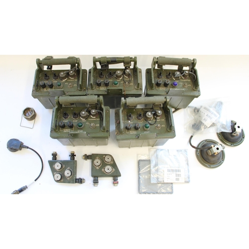 878 - Set of 5 late C20th British military transmitters and associated spares and accessories