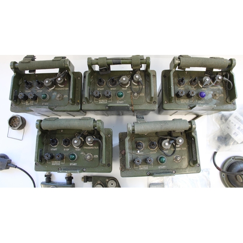 878 - Set of 5 late C20th British military transmitters and associated spares and accessories