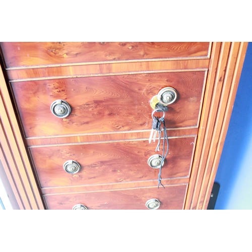 128 - Five gun cabinet incorporating shelving with single lock with yew wood cabinet draw front in good co... 