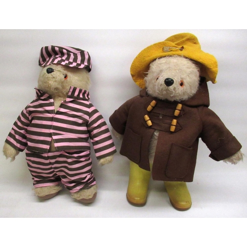 126 - Two Gabrielle design Paddington Bears, one in raincoat and rainboots, and one in prison outfit (2)