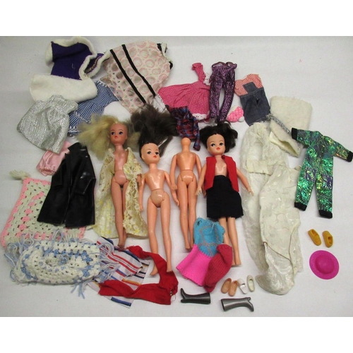 243 - Sindy; three Sindy dolls, heads stamped Sindy 033055x and 2 Gen 1077 033055x, a doll body, and a col... 