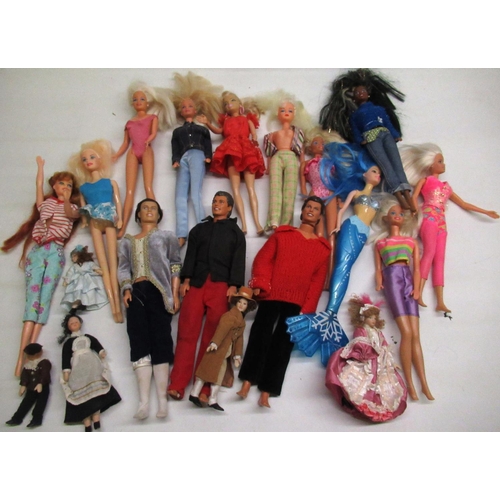 247 - Ten 1980s-2000s Mattel Barbie and Ken dolls, other similar dolls and a family of bisque headed dolls... 