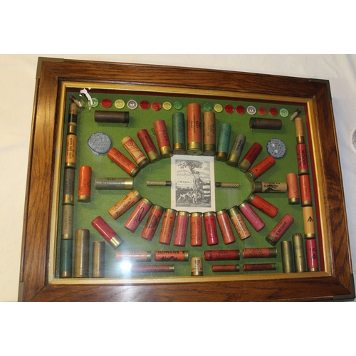 138 - Large framed wall mounted shotgun cartridge display board including Gowers, Purdy, Imperial, Eley ga... 