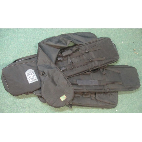 154 - Three gun bags with storage pockets, and one nylon gun slip (4)