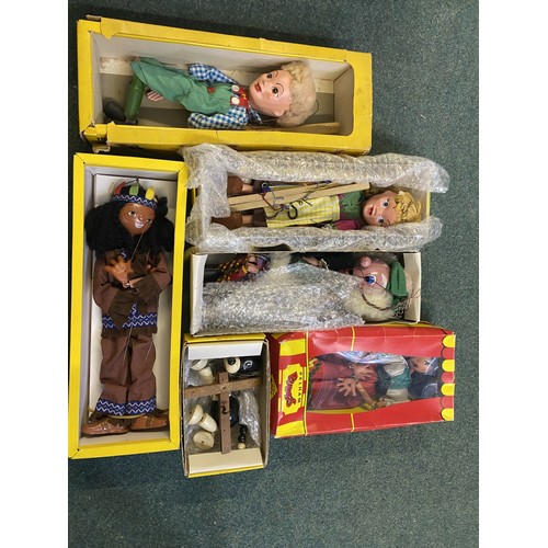 254 - Group of six boxed Pelham Puppets including Hansel, Indian Boy, etc. (6)