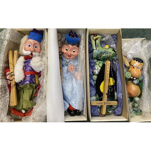 250 - Four Pelham Puppets, Mother and Baby Dragon, and King and Queen puppets, all boxed.