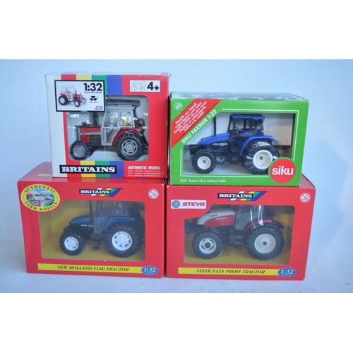 106 - Four boxed 1/32 tractor models to include 3 x Britain's, a Steyr 6135 Profi (model mint/never remove... 