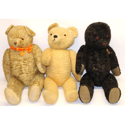 57 - Mid C20th large black teddy bear, and two similar sized blonde bear